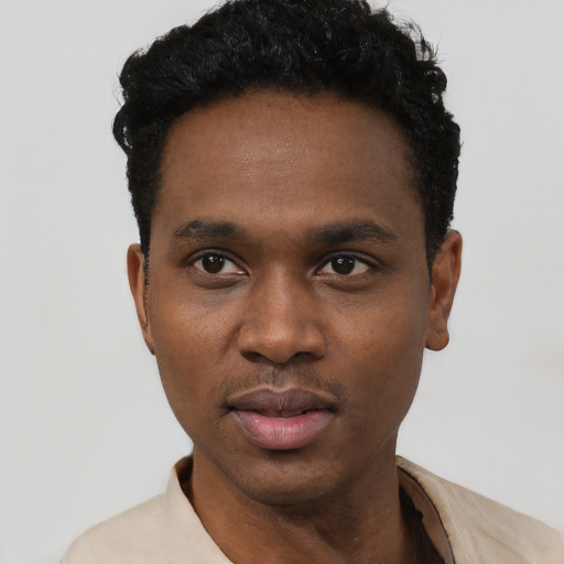 Neutral black young-adult male with short  black hair and brown eyes