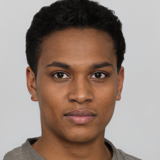Neutral black young-adult male with short  black hair and brown eyes