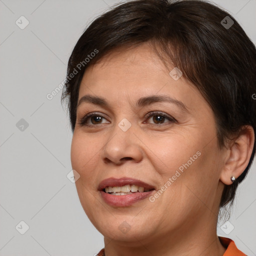 Joyful white adult female with medium  brown hair and brown eyes