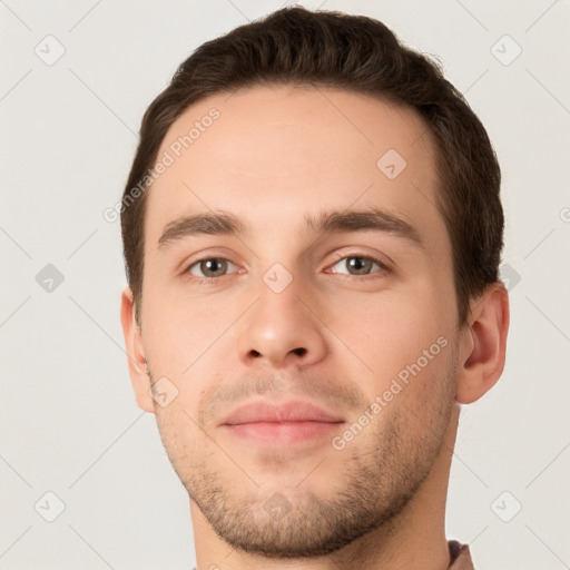 Neutral white young-adult male with short  brown hair and brown eyes