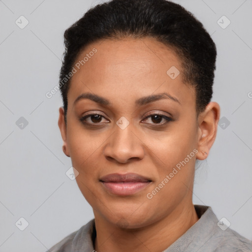 Joyful latino young-adult female with short  brown hair and brown eyes