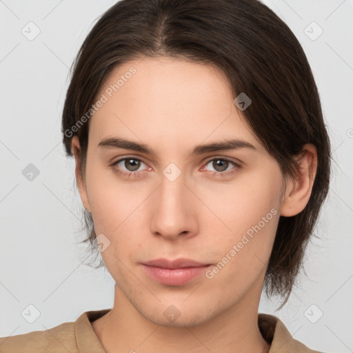 Neutral white young-adult female with medium  brown hair and brown eyes