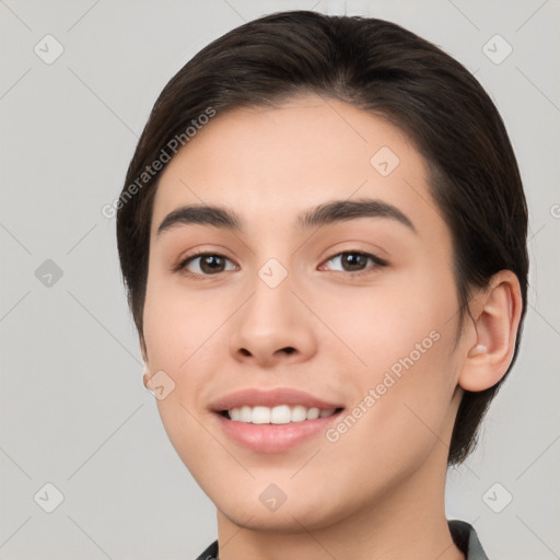 Joyful white young-adult female with medium  brown hair and brown eyes