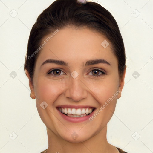 Joyful white young-adult female with short  black hair and brown eyes