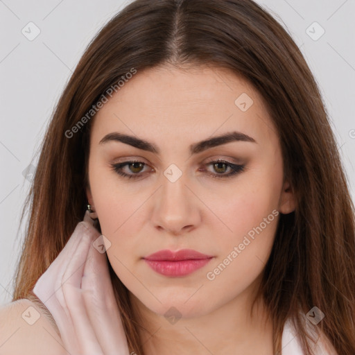 Neutral white young-adult female with long  brown hair and brown eyes