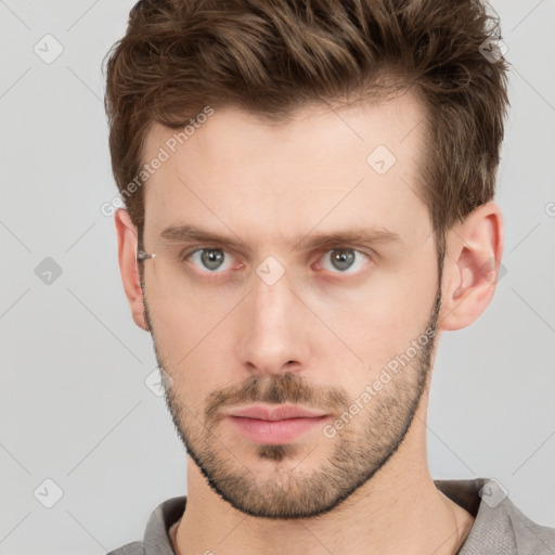 Neutral white young-adult male with short  brown hair and grey eyes