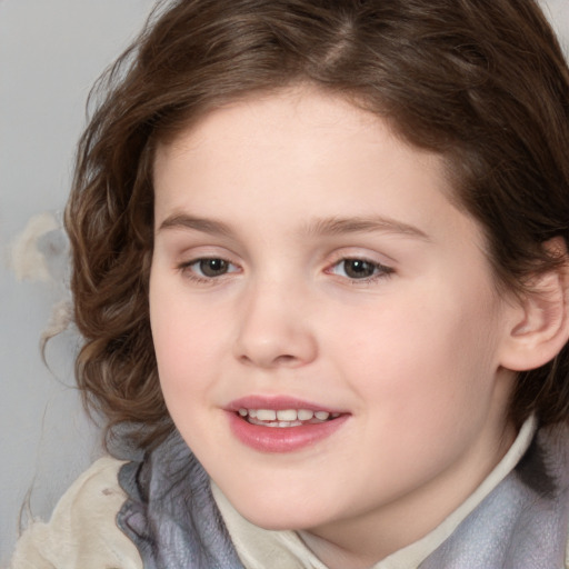 Joyful white child female with medium  brown hair and brown eyes