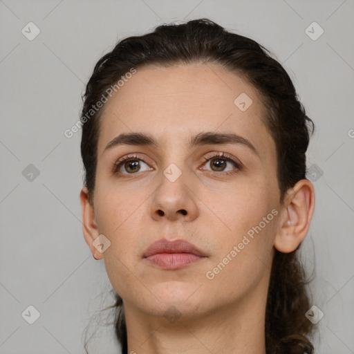 Neutral white young-adult female with medium  brown hair and brown eyes