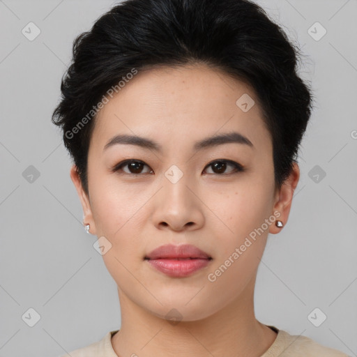 Joyful asian young-adult female with short  black hair and brown eyes