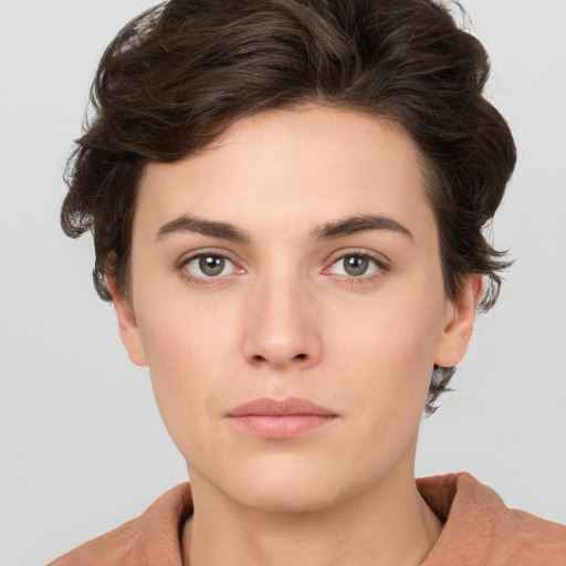 Neutral white young-adult female with short  brown hair and brown eyes