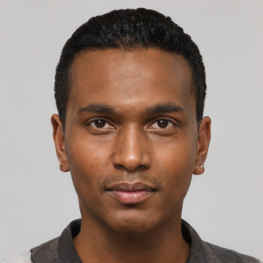 Neutral black young-adult male with short  black hair and brown eyes