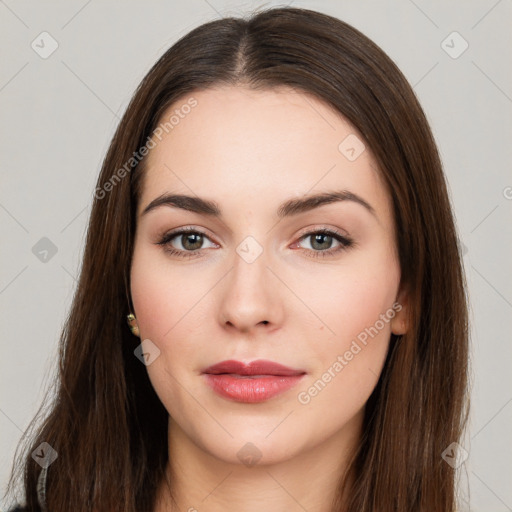 Neutral white young-adult female with long  brown hair and brown eyes