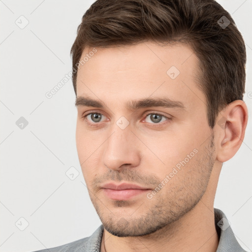 Neutral white young-adult male with short  brown hair and brown eyes