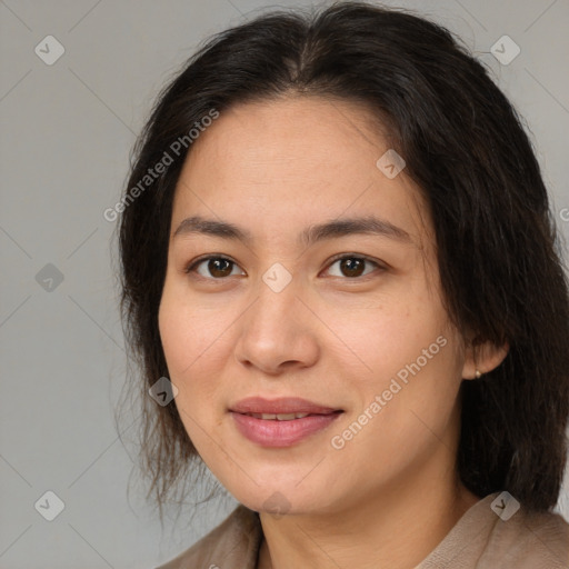 Joyful white adult female with medium  brown hair and brown eyes