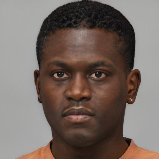 Neutral black young-adult male with short  brown hair and brown eyes
