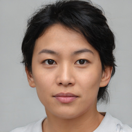 Neutral asian young-adult female with medium  black hair and brown eyes