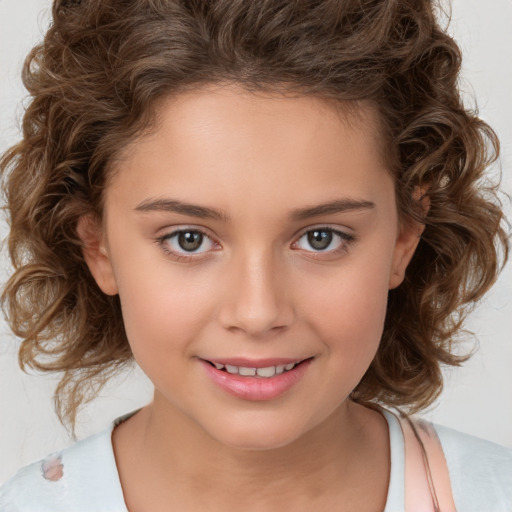 Joyful white child female with medium  brown hair and brown eyes