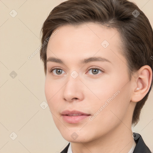 Neutral white young-adult female with short  brown hair and brown eyes