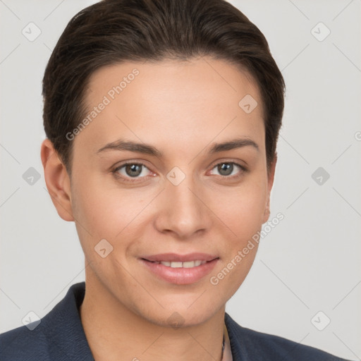 Joyful white young-adult female with short  brown hair and brown eyes