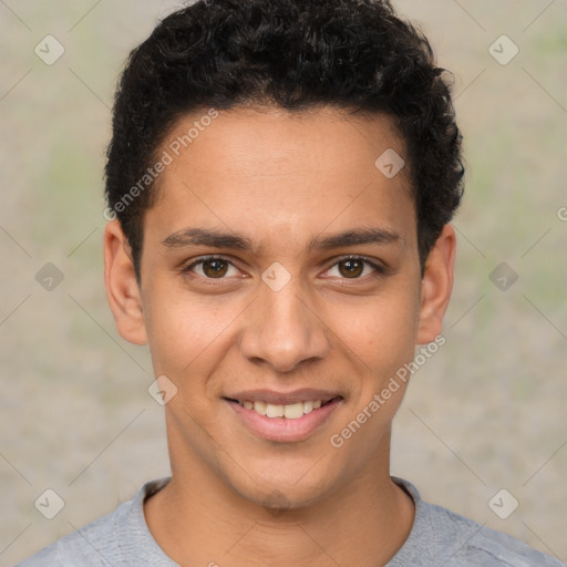 Joyful latino young-adult male with short  brown hair and brown eyes