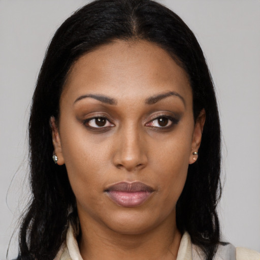 Neutral latino young-adult female with long  black hair and brown eyes