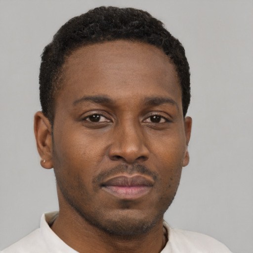 Neutral black young-adult male with short  brown hair and brown eyes