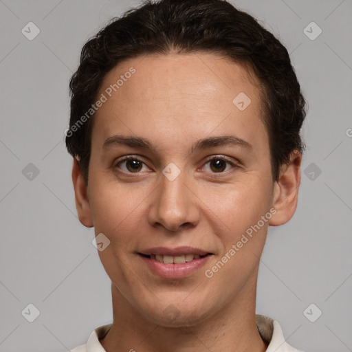 Joyful white young-adult female with short  brown hair and brown eyes