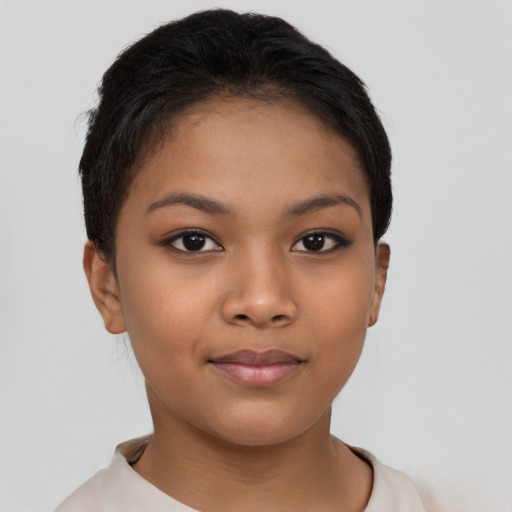 Joyful latino young-adult female with short  brown hair and brown eyes