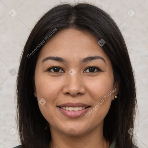 Joyful latino young-adult female with medium  brown hair and brown eyes