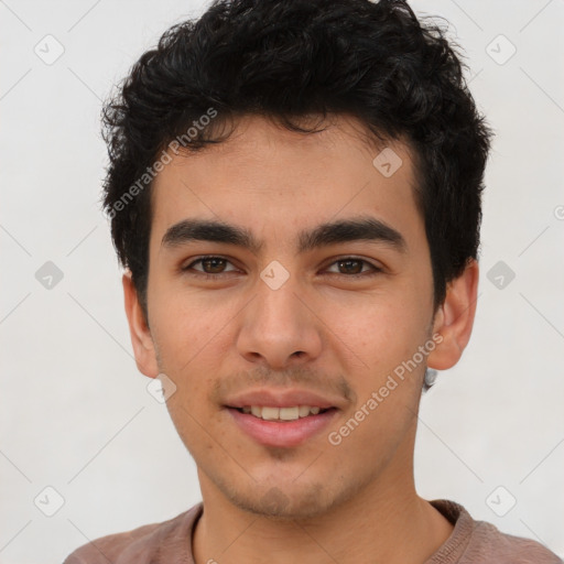 Joyful latino young-adult male with short  brown hair and brown eyes