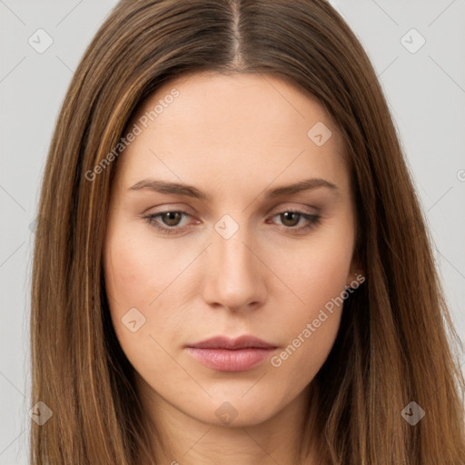 Neutral white young-adult female with long  brown hair and brown eyes