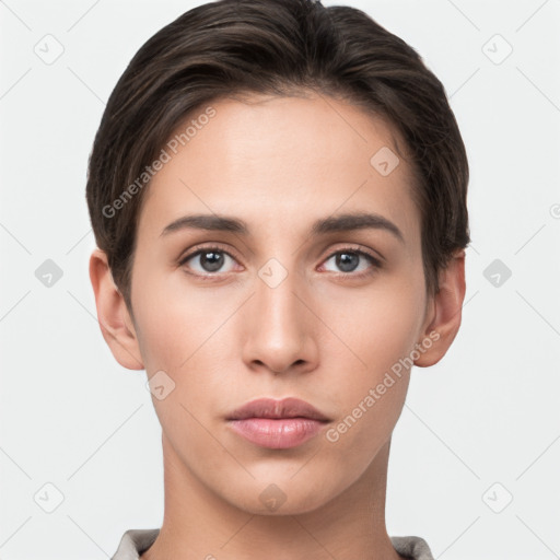 Neutral white young-adult female with short  brown hair and brown eyes