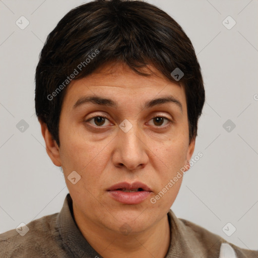 Joyful white adult female with short  brown hair and brown eyes