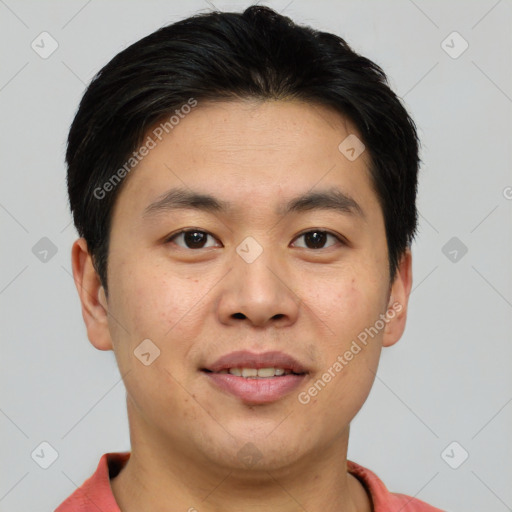 Joyful asian young-adult male with short  brown hair and brown eyes