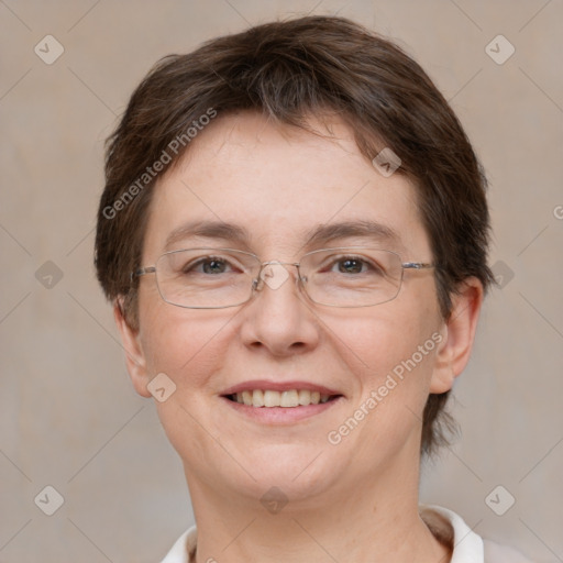 Joyful white adult female with short  brown hair and brown eyes