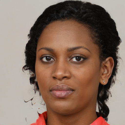 Neutral black young-adult female with medium  black hair and brown eyes