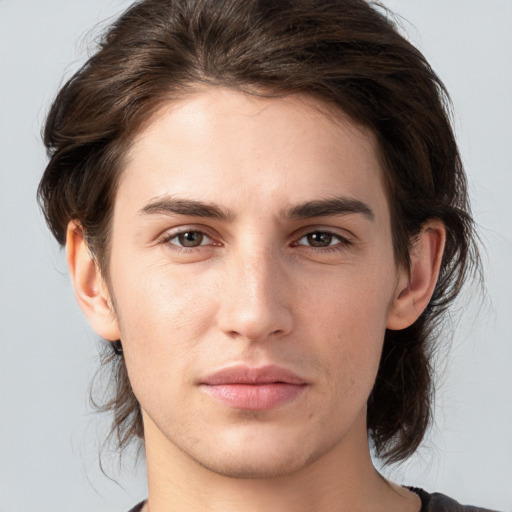 Neutral white young-adult male with medium  brown hair and brown eyes