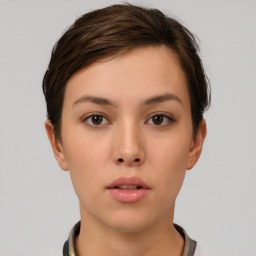 Neutral white young-adult female with short  brown hair and brown eyes