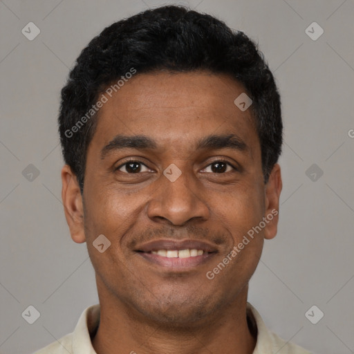 Joyful latino young-adult male with short  black hair and brown eyes