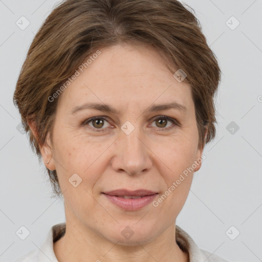 Joyful white adult female with short  brown hair and grey eyes