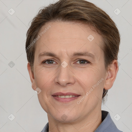 Joyful white adult male with short  brown hair and grey eyes