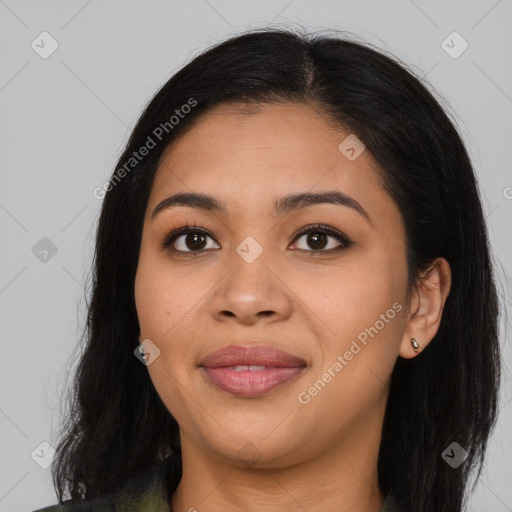 Joyful latino young-adult female with long  brown hair and brown eyes