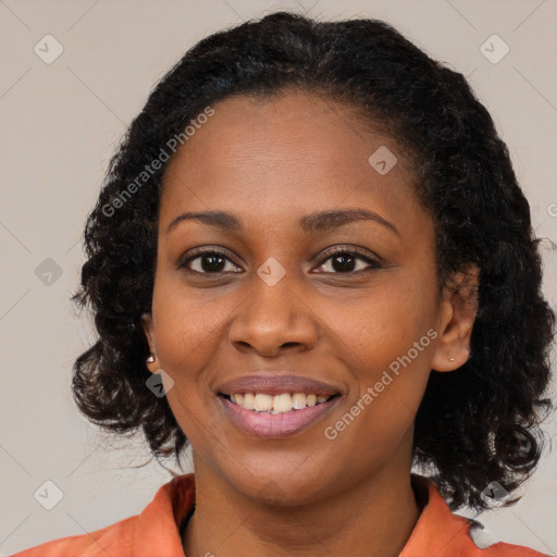 Joyful latino young-adult female with medium  black hair and brown eyes