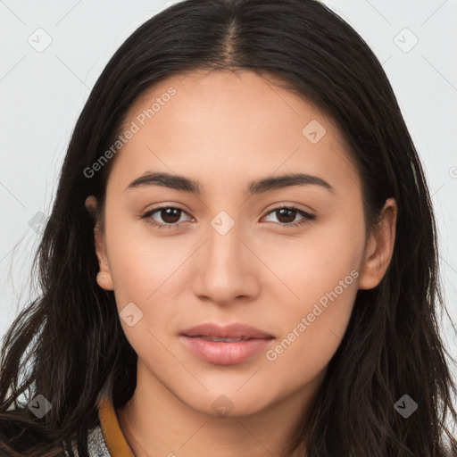 Joyful latino young-adult female with long  brown hair and brown eyes