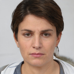 Neutral white young-adult female with short  brown hair and brown eyes