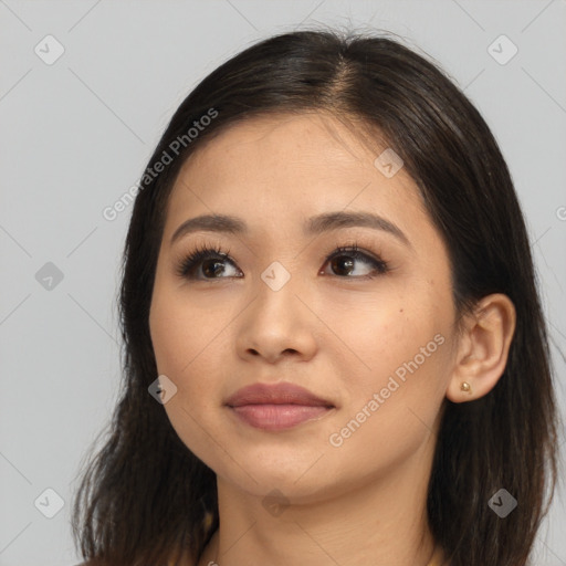 Neutral white young-adult female with long  brown hair and brown eyes