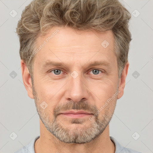 Neutral white adult male with short  brown hair and brown eyes