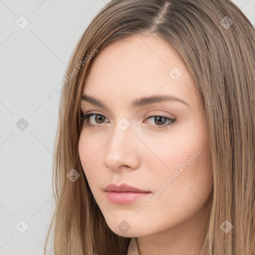 Neutral white young-adult female with long  brown hair and brown eyes