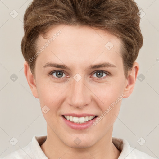 Joyful white young-adult female with short  brown hair and grey eyes