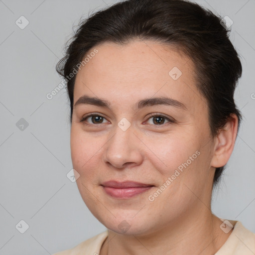 Joyful white young-adult female with medium  brown hair and brown eyes